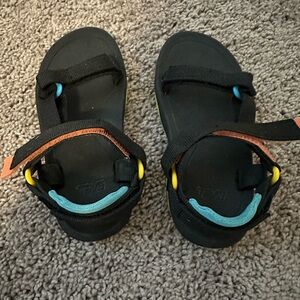 Teva Kids Black Sandals with Blue and Yellow Accents